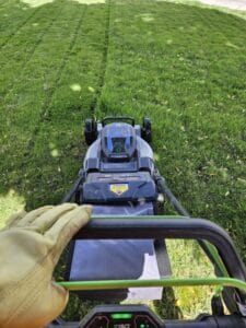 Mowing green lawn