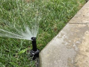 Making sure that the lawn is getting watered properly